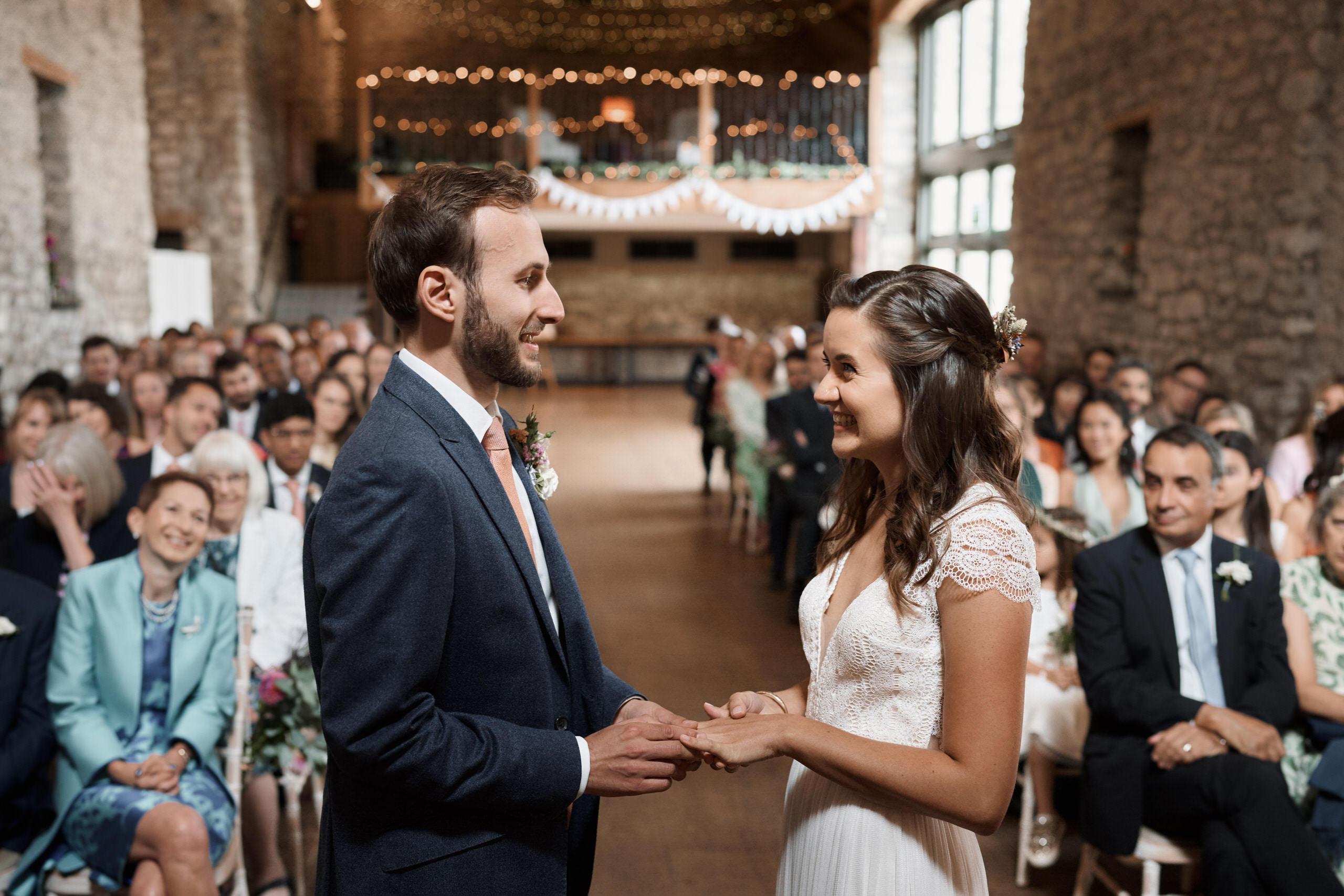 A couple gets married in a barn by swapping their promises.