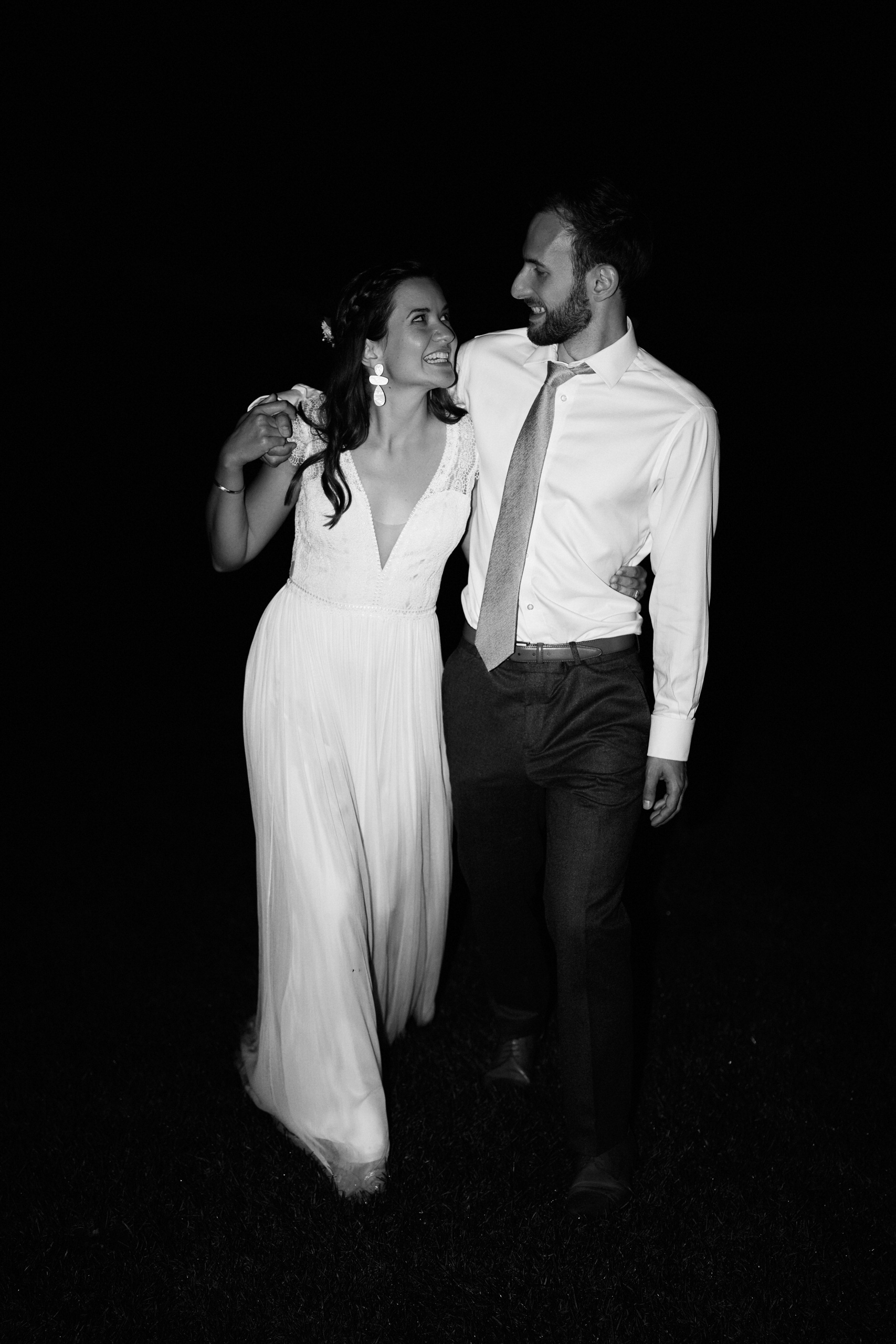 A picture in black and white of a couple on their wedding day.