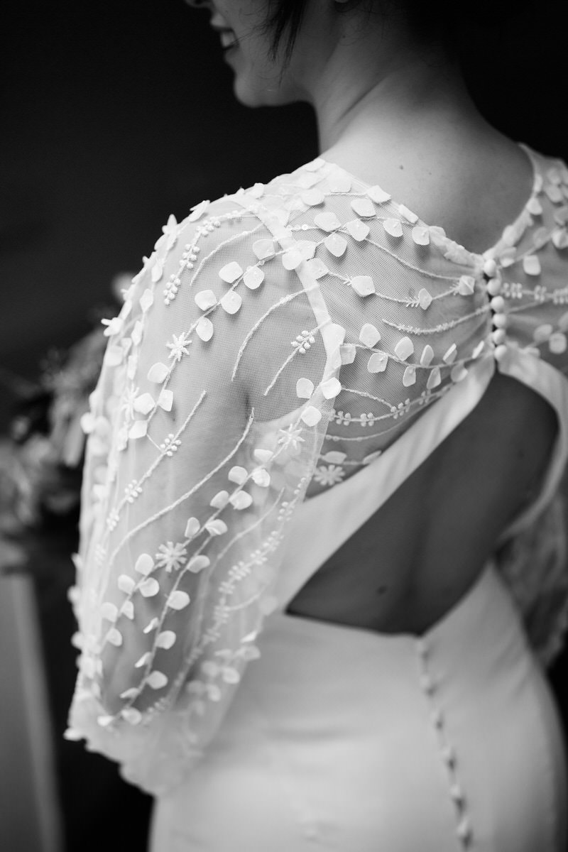 The rear part of a bride's wedding gown.