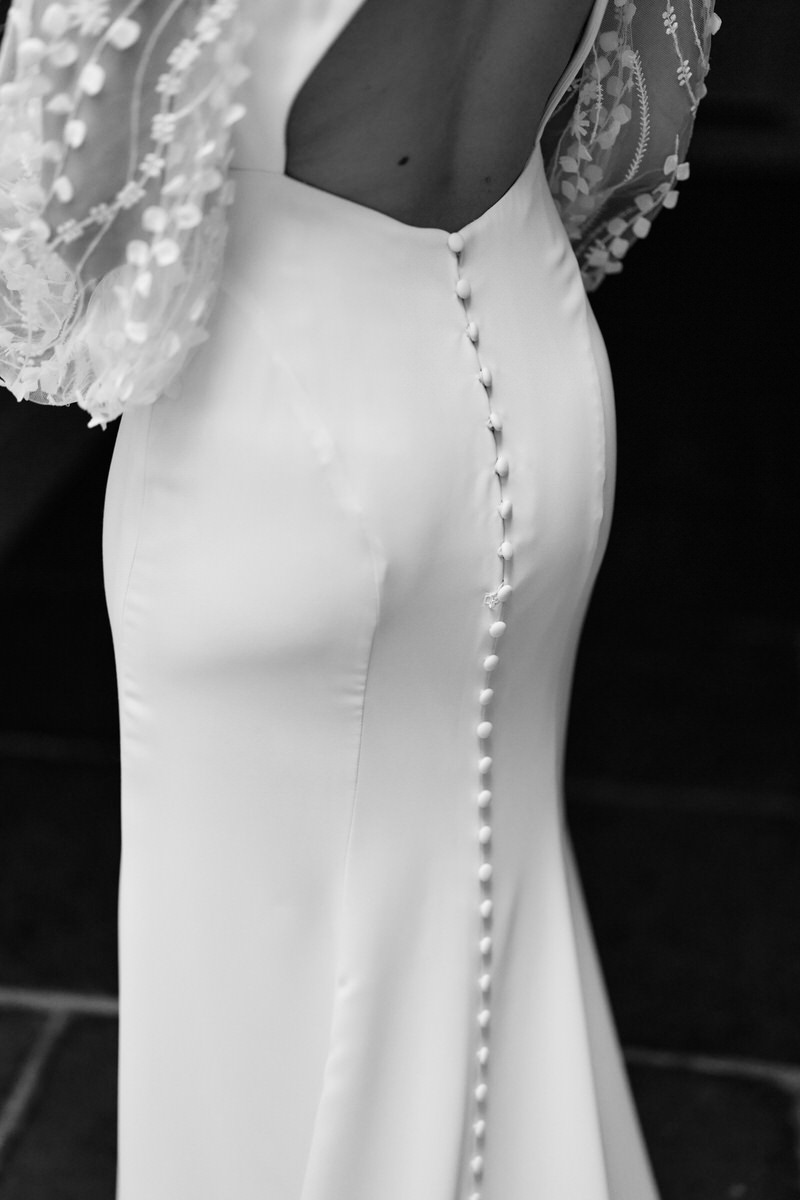 The rear part of a woman's bridal gown.