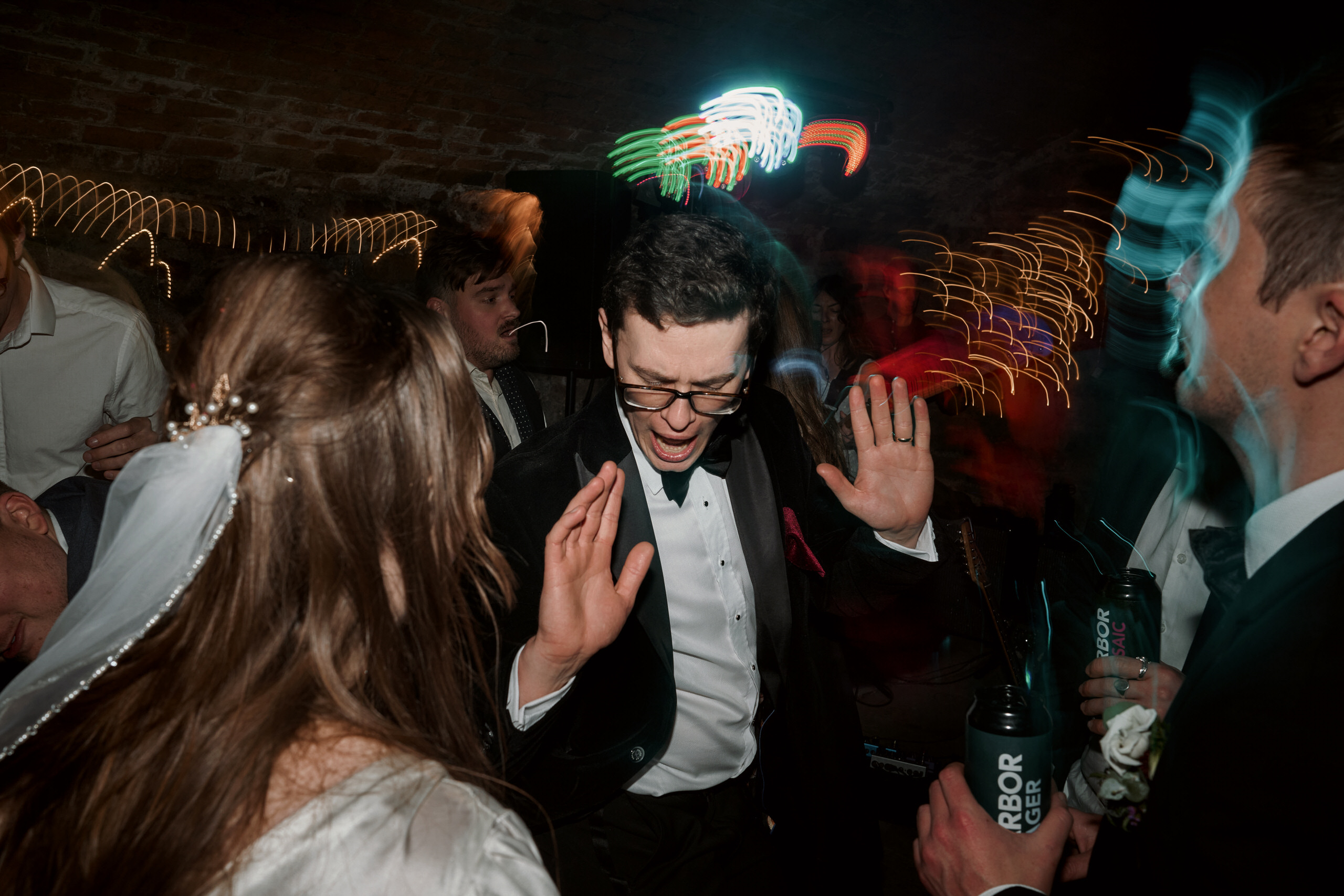 A couple dancing at their wedding party.