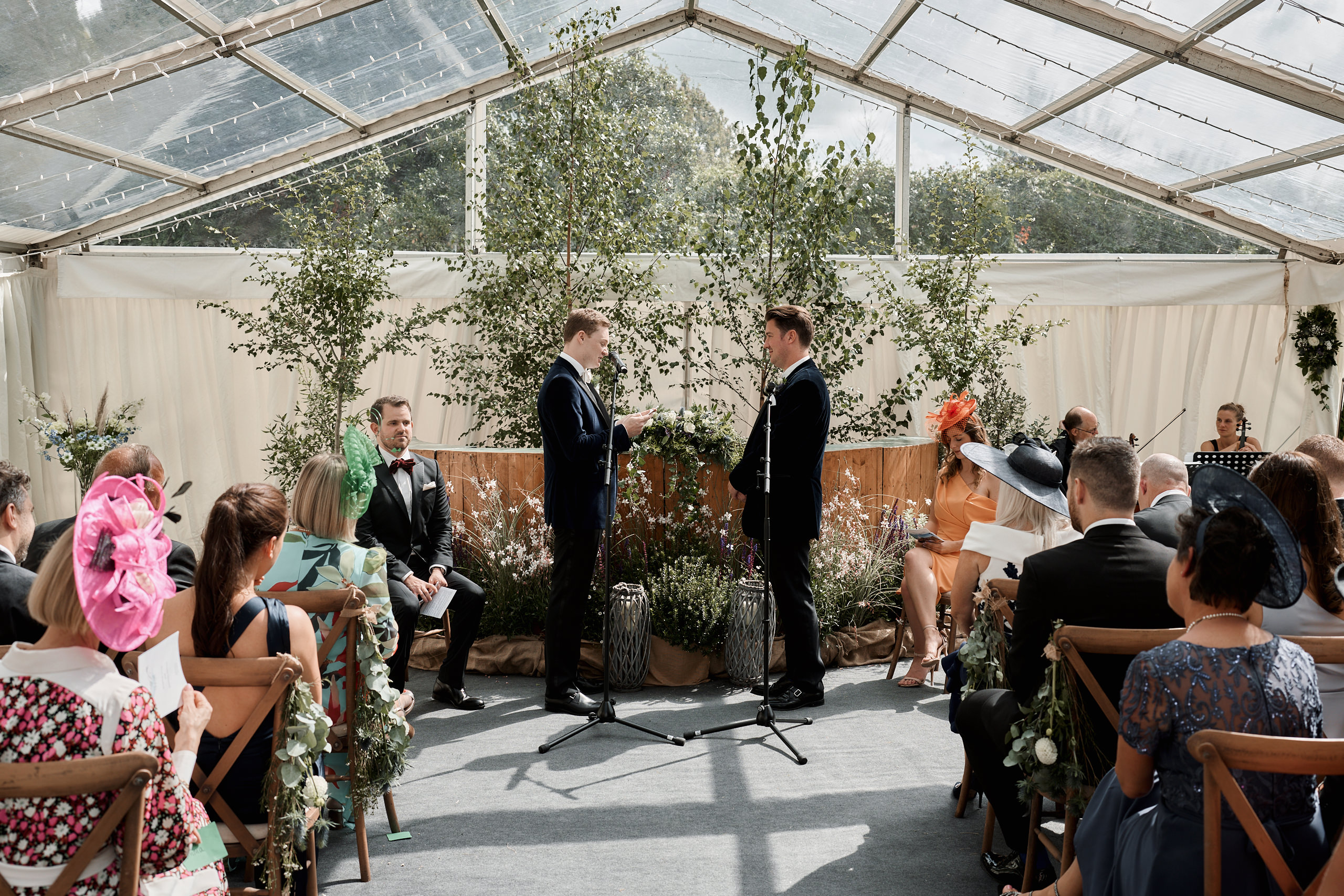 A wedding taking place in a tent.